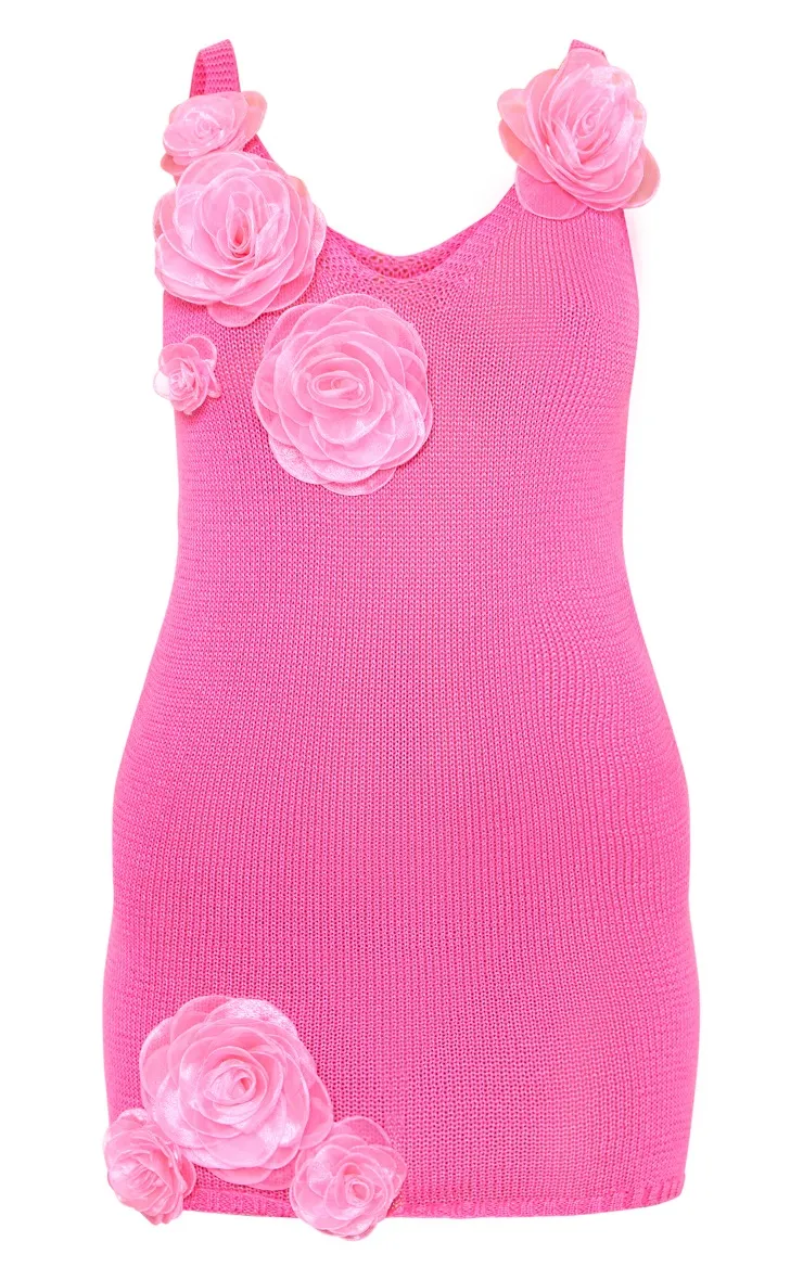 Mini-robe rose vif fleurie maille tricot en V
