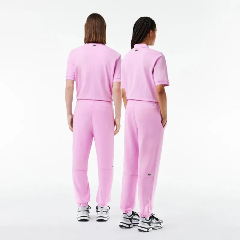 PANTALON DE SURVÊTEMENT LACOSTE UNISEXE EN MOLLETON DE COTON BIOLOGIQUE ROSE